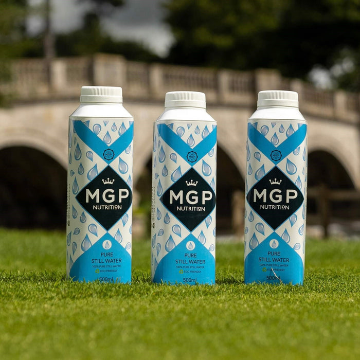 MGP Nutrition Wholesale Pure Still Water 24 x 500ml. 3 Bottles on grass