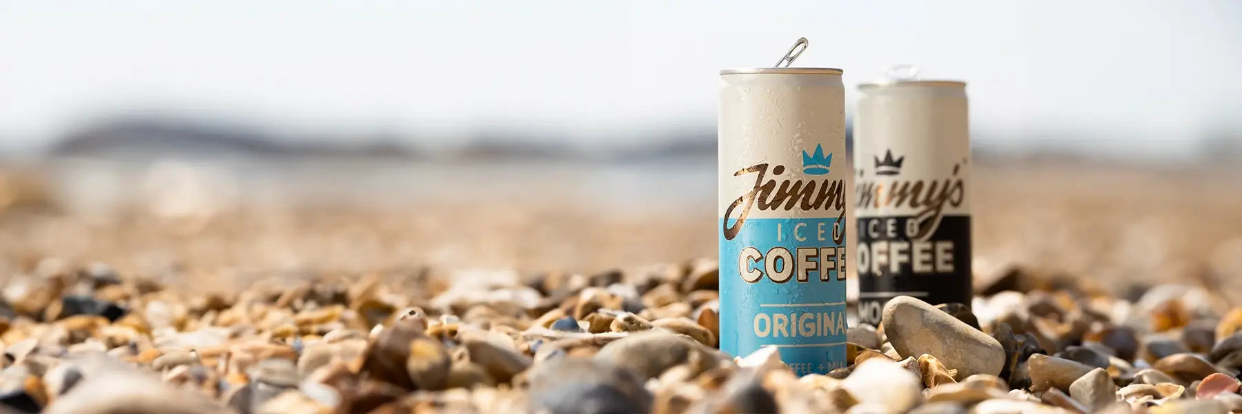 Jimmy's Iced Coffee 2 cans on beach