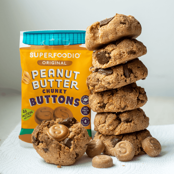 Original Peanut Butter Butons 15 x 20g - Superfoodio. Stack peanut butter cookies and buttons piled next to the bag